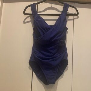 - Lands End one piece swim suit.  Built in bra, size 6P, like new.